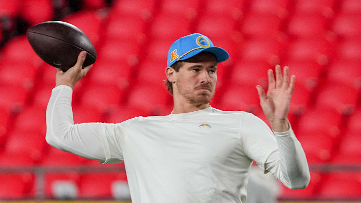 Dec 8, 2024; Kansas City, Missouri, USA; Los Angeles Chargers quarterback Justin Herbert (10) warms up against the Kansas City Chiefs prior to a game at GEHA Field at Arrowhead Stadium. Mandatory Credit: Denny Medley-Imagn Images