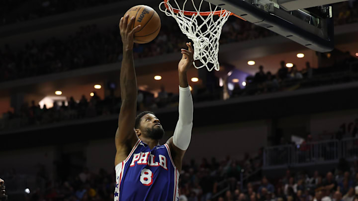 Oct 11, 2024; Des Moines, Iowa, USA; Philadelphia 76ers forward Paul George (8) scores a basket against the Minnesota Timberwolves at Wells Fargo Arena. Mandatory Credit: Reese Strickland-Imagn Images