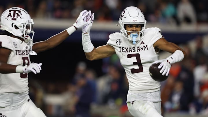 Nov 23, 2024; Auburn, Alabama, USA;  Texas A&M Aggies wide receiver Noah Thomas (3) celebrates with Texas A&M Aggies wide receiver Jahdae Walker (9) after scoring a touchdown against the Auburn Tigers in the third quarter at Jordan-Hare Stadium.