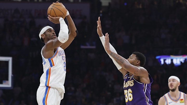Nov 12, 2025; Oklahoma City, Oklahoma, USA; Oklahoma City Thunder guard Shai Gilgeous-Alexander (2) shoots over Los Angeles Lakers guard Marcus Smart (36) during the second quarter at Paycom Center. Mandatory Credit: Alonzo Adams-Imagn Images Nov 12, 2025; Oklahoma City, Oklahoma, USA; Oklahoma City Thunder guard Shai Gilgeous-Alexander (2) shoots over Los Angeles Lakers guard Marcus Smart (36) during the second quarter at Paycom Center. Mandatory Credit: Alonzo Adams-Imagn Images