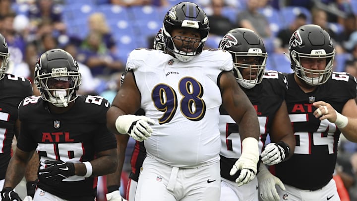 Aug 17, 2024; Baltimore, Maryland, USA; Baltimore Ravens defensive tackle Travis Jones (98) reacts during the first half against the Atlanta Falcons at M&T Bank Stadium. Mandatory Credit: Tommy Gilligan-Imagn Images