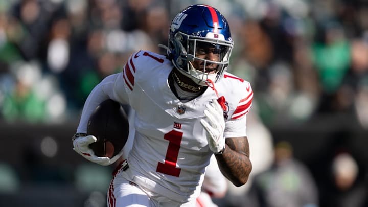 Jan 5, 2025; Philadelphia, Pennsylvania, USA; New York Giants wide receiver Malik Nabers (1) runs with the ball against the Philadelphia Eagles during the first quarter at Lincoln Financial Field. Mandatory Credit: Bill Streicher-Imagn Images