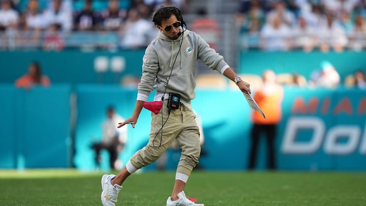 Miami Dolphins head coach Mike McDaniel walks on the field during the second half against the New England Patriots at Hard Rock Stadium.