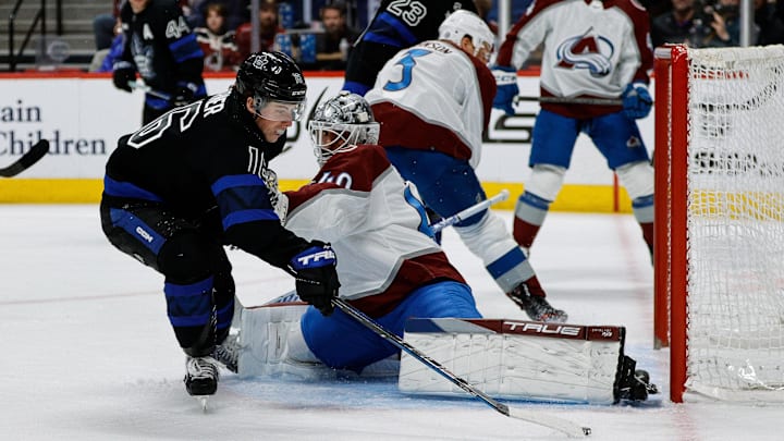 Feb 24, 2024; Denver, Colorado, USA; Colorado Avalanche goaltender Alexandar Georgiev (40) makes a save against Toronto Maple Leafs right wing Mitchell Marner (16) in the first period at Ball Arena. Mandatory Credit: Isaiah J. Downing-Imagn Images