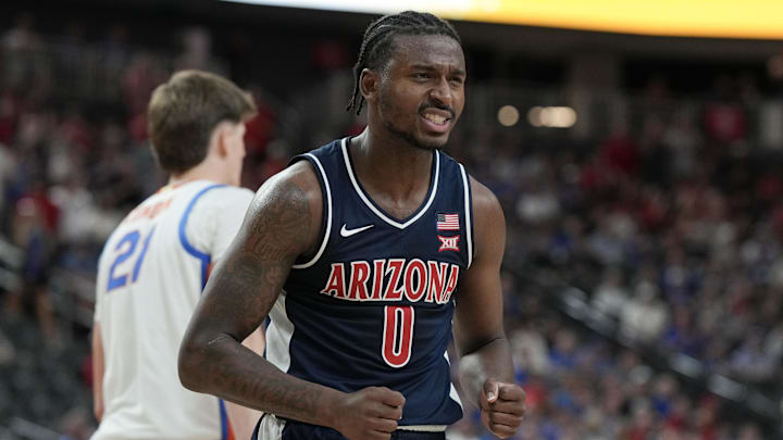 Nov 3, 2025; Las Vegas, NV, USA; Arizona Wildcats guard Jaden Bradley (0) celebrates a play against the Florida Gators in the first half of the Hall of Fame Series game at T-Mobile Arena. Mandatory Credit: Candice Ward-Imagn Images Nov 3, 2025; Las Vegas, NV, USA; Arizona Wildcats guard Jaden Bradley (0) celebrates a play against the Florida Gators in the first half of the Hall of Fame Series game at T-Mobile Arena. Mandatory Credit: Candice Ward-Imagn Images