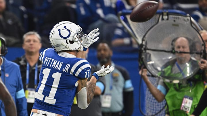 Jan 5, 2025; Indianapolis, Indiana, USA; Indianapolis Colts wide receiver Michael Pittman Jr. (11) catches a pass during the second quarter against the Jacksonville Jaguars at Lucas Oil Stadium. Mandatory Credit: Marc Lebryk-Imagn Images
