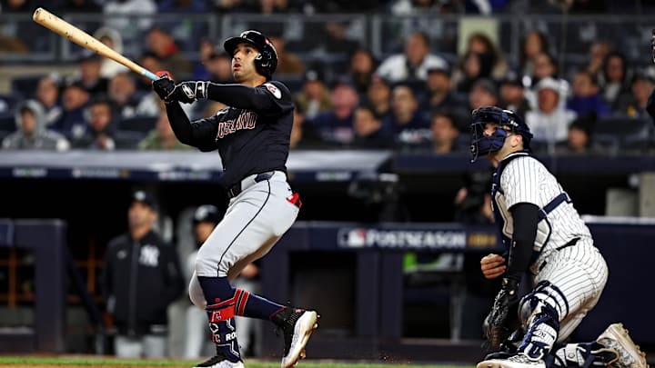 Oct 14, 2024; Bronx, New York, USA; Cleveland Guardians shortstop Brayan Rocchio (4) hits a solo home run during the sixth inning against the New York Yankees in Game 1 of the ALCS for the 2024 MLB Playoffs at Yankee Stadium.