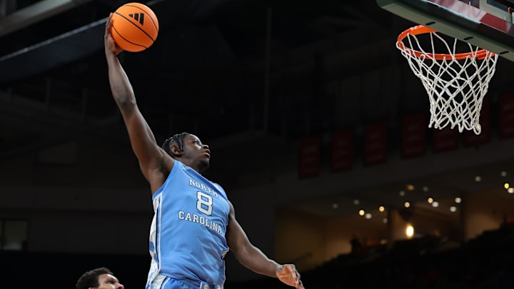 Feb 10, 2026; Coral Gables, Florida, USA; North Carolina Tar Heels forward Caleb Wilson (8) dunks against the Miami Hurricanes during the second half at Watsco Center. Mandatory Credit: Sam Navarro-Imagn Images