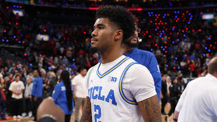 Nov 14, 2025; Inglewood, California, USA;  UCLA Bruins guard Donovan Dent (2) leaves the court after defeated by the Arizona Wildcats 69-65 at Intuit Dome. Mandatory Credit: Kiyoshi Mio-Imagn Images