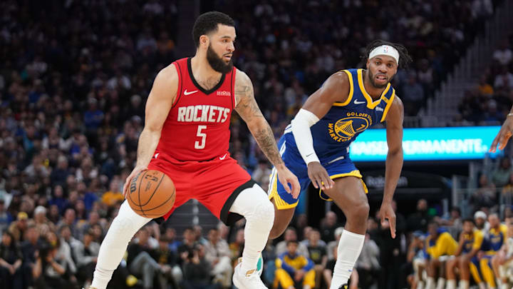 Apr 6, 2025; San Francisco, California, USA; Houston Rockets guard Fred VanVleet (5) dribbles the ball in front of Golden State Warriors guard Buddy Hield (7) in the fourth quarter at the Chase Center. Mandatory Credit: Cary Edmondson-Imagn Images