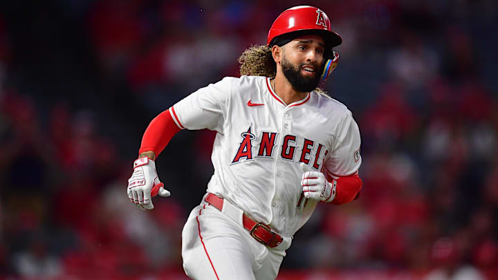 Los Angeles Angels shortstop Jack Lopez runs after hitting a double against the Texas Rangers on Sept. 27 at Angel Stadium. Los Angeles Angels shortstop Jack Lopez runs after hitting a double against the Texas Rangers on Sept. 27 at Angel Stadium.