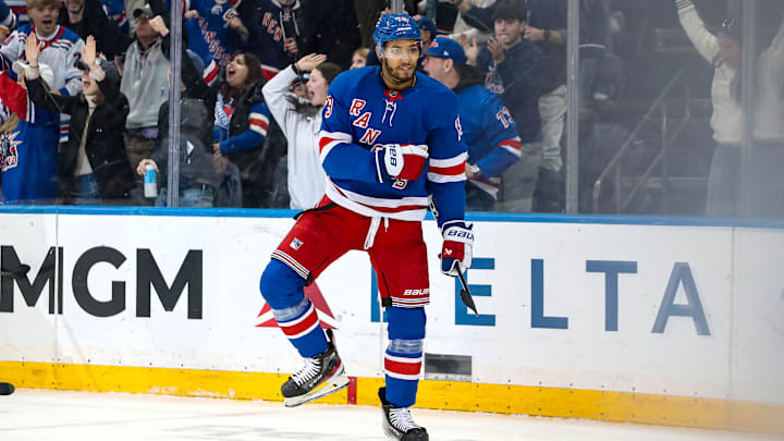 Mar 22, 2025; New York, New York, USA; New York Rangers defenseman K'Andre Miller (79) celebrates his goal against the Vancouver Canucks during the third period at Madison Square Garden.