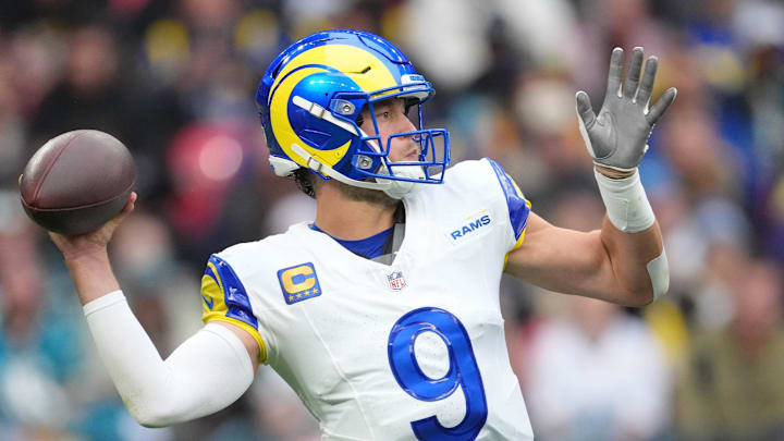 Oct 19, 2025; London, United Kingdom; Los Angeles Rams quarterback Matthew Stafford (9) passes the ball against the Jacksonville Jaguars during the first half of an NFL International Series game at Wembley Stadium. Mandatory Credit: Kirby Lee-Imagn Images