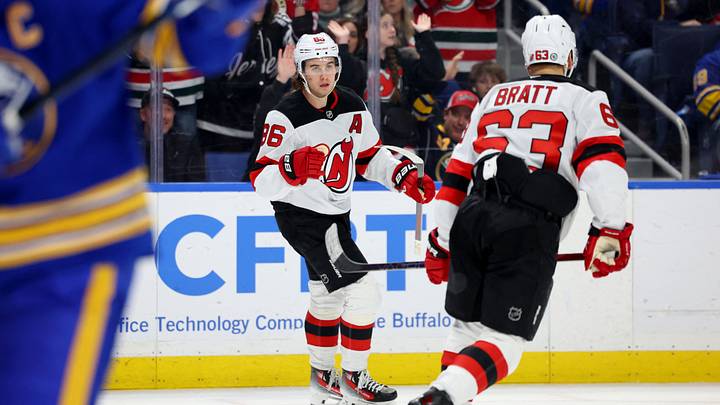 New Jersey Devils center Jack Hughes (86) reacts after scoring a shorthanded goal during the third period against the Buffalo Sabres at KeyBank Center. Mandatory Credit: Timothy T. Ludwig-Imagn Images