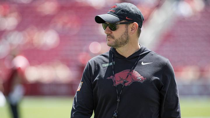 Arkansas Razorbacks head coach Ryan Silverfield looks over his players during warmups before the spring game at Donald W. Reynolds Razorback Stadium. Arkansas Razorbacks head coach Ryan Silverfield looks over his players during warmups before the spring game at Donald W. Reynolds Razorback Stadium.