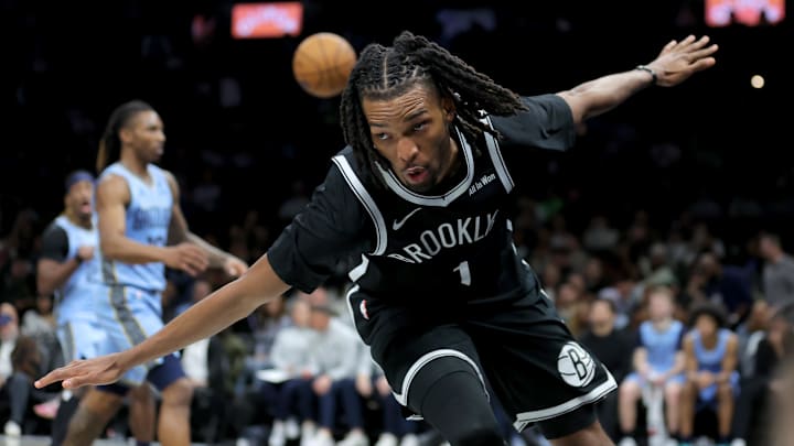Mar 9, 2026; Brooklyn, New York, USA; Brooklyn Nets forward Ziaire Williams (1) celebrates his dunk against the Memphis Grizzlies during the third quarter at Barclays Center. Mandatory Credit: Brad Penner-Imagn Images