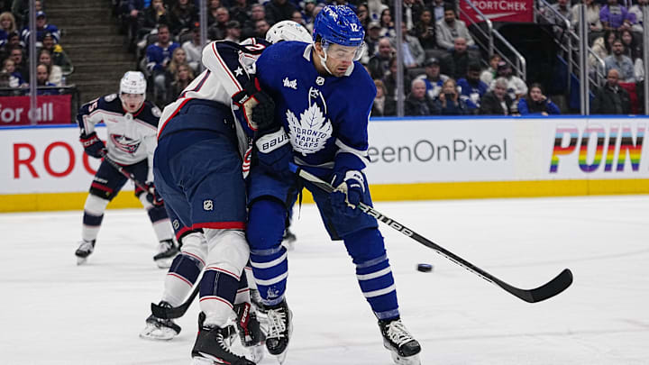 Apr 4, 2023; Toronto, Ontario, CAN; Toronto Maple Leafs forward Zach Aston-Reese (12) scores his second goal of the game on this defelction against the Columbus Blue Jackets during the third period at Scotiabank Arena. Mandatory Credit: John E. Sokolowski-Imagn Images Apr 4, 2023; Toronto, Ontario, CAN; Toronto Maple Leafs forward Zach Aston-Reese (12) scores his second goal of the game on this defelction against the Columbus Blue Jackets during the third period at Scotiabank Arena. Mandatory Credit: John E. Sokolowski-Imagn Images