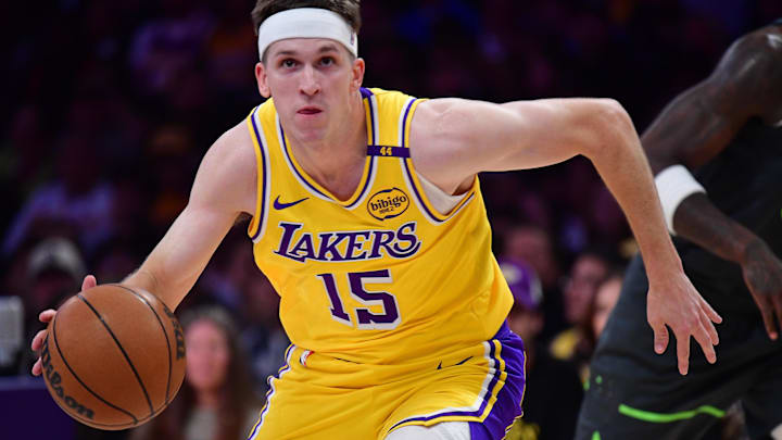 Apr 30, 2025; Los Angeles, California, USA; Los Angeles Lakers guard Austin Reaves (15) moves to the basket against the Minnesota Timberwolves during the first half in game five of first round for the 2025 NBA Playoffs at Crypto.com Arena. Mandatory Credit: Gary A. Vasquez-Imagn Images