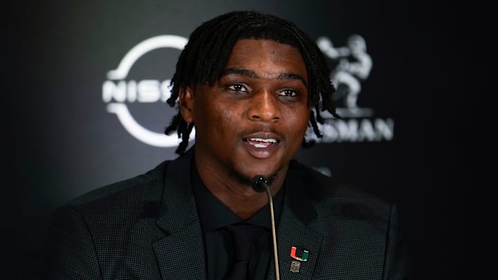 Dec 14, 2024; New York, NY, USA; Miami Hurricanes quarterback Cam Ward speaks on stage during a press conference before the 2024 Heisman Trophy Presentation. Mandatory Credit: Lucas Boland-Imagn Images