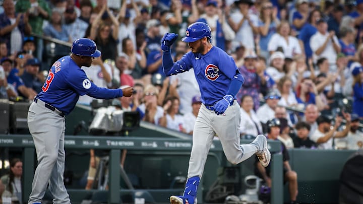 Sep 14, 2024; Denver, Colorado, USA; Chicago Cubs outfielder Cody Bellinger (24) hits a home run against the Colorado Rockies at Coors Field. 