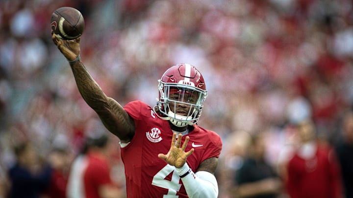 Sep 28, 2024; Tuscaloosa, Alabama, USA; Alabama Crimson Tide quarterback Jalen Milroe (4) throws a pass during warm ups before a game against the Georgia Bulldogs at Bryant-Denny Stadium. 