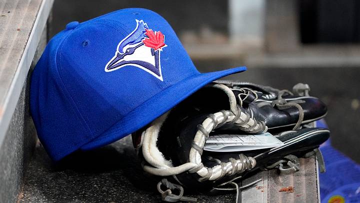 A Toronto Blue Jays hat and glove. Credit: John E. Sokolowski-Imagn Images A Toronto Blue Jays hat and glove. Credit: John E. Sokolowski-Imagn Images