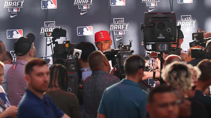 Jul 14, 2024; Ft. Worth, TX, USA;  Christian Moore speaks to the media after being selected by the Los Angeles Angels as the eight player taken during the first round of the MLB Draft at Cowtown Coliseum. Mandatory Credit: Kevin Jairaj-Imagn Images
