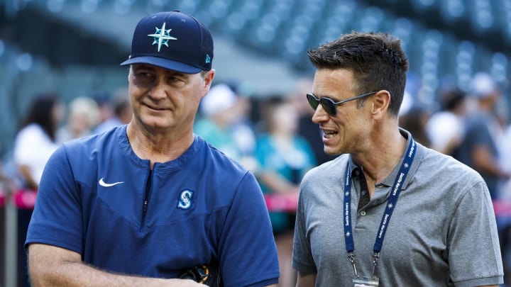 Seattle Mariners manager Scott Servais, left, and general manger Jerry Dipoto talk during batting practice on Aug. 9, 2022, at T-Mobile Park. Seattle Mariners manager Scott Servais, left, and general manger Jerry Dipoto talk during batting practice on Aug. 9, 2022, at T-Mobile Park.