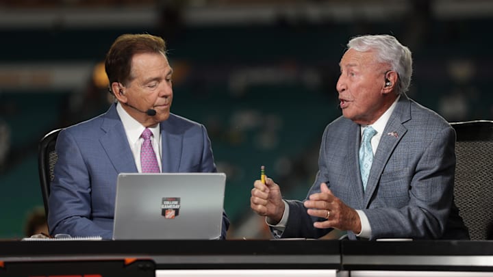 Jan 9, 2025; Miami, FL, USA; ESPN analysts Nick Saban and Lee Corso before the game between the Notre Dame Fighting Irish and the Penn State Nittany Lions in the Orange Bowl at Hard Rock Stadium. Mandatory Credit: Nathan Ray Seebeck-Imagn Images