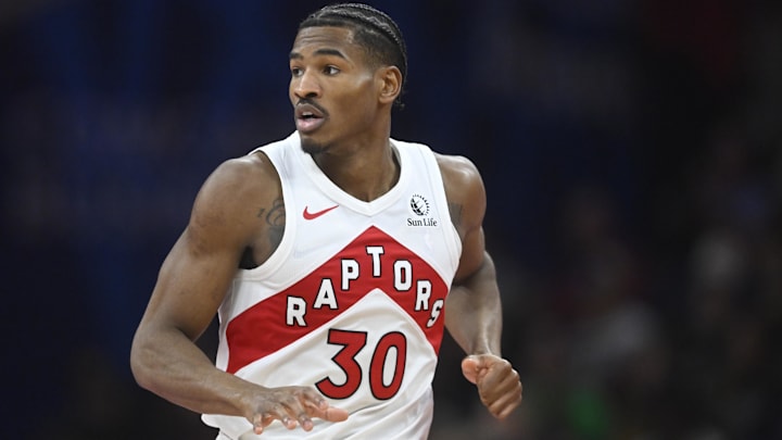Oct 31, 2025; Cleveland, Ohio, USA; Toronto Raptors guard Ochai Agbaji (30) runs on the court in the third quarter against the Cleveland Cavaliers at Rocket Arena. Mandatory Credit: David Richard-Imagn Images