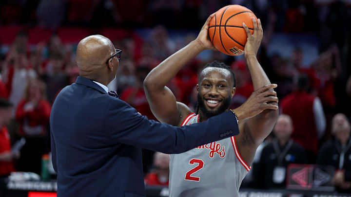 Mar 7, 2026; Columbus, Ohio, USA;  Ohio State Buckeyes guard Bruce Thornton (2) celebrates breaking the school all time scoring record with former recored holder Dennis Hopson during the first half at Value City Arena. Mandatory Credit: Joseph Maiorana-Imagn Images
