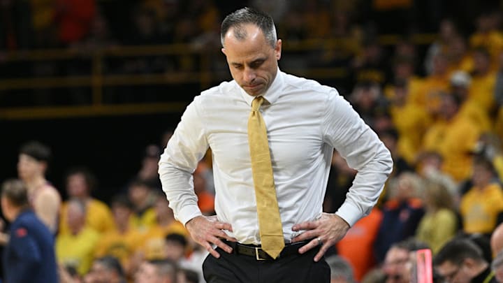 Iowa Hawkeyes head coach Ben McCollum