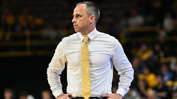 Iowa Hawkeyes head coach Ben McCollum