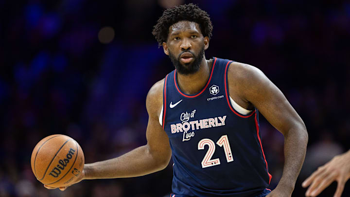 Dec 20, 2023; Philadelphia, Pennsylvania, USA; Philadelphia 76ers center Joel Embiid (21) dribbles up court against the Minnesota Timberwolves during the third quarter at Wells Fargo Center. Mandatory Credit: Bill Streicher-Imagn Images