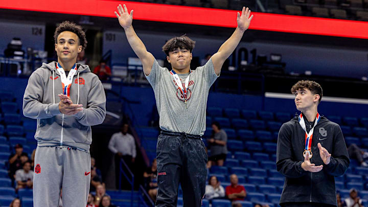 Aug 9, 2025; New Orleans, LA, USA;  Asher Hong of Stanford wins a gold medal on vault after day two of the senior men’s 2025 Xfinity U.S. Gymnastics Championships at Smoothie King Center. Mandatory Credit: Stephen Lew-Imagn Images