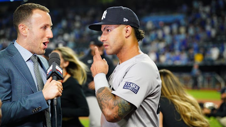 Oct 10, 2024; Kansas City, Missouri, USA; New York Yankees second baseman Gleyber Torres (25) is interviewed following a win over the Kansas City Royals during game four of the ALDS for the 2024 MLB Playoffs at Kauffman Stadium. Mandatory Credit: Denny Medley-Imagn Images Oct 10, 2024; Kansas City, Missouri, USA; New York Yankees second baseman Gleyber Torres (25) is interviewed following a win over the Kansas City Royals during game four of the ALDS for the 2024 MLB Playoffs at Kauffman Stadium. Mandatory Credit: Denny Medley-Imagn Images