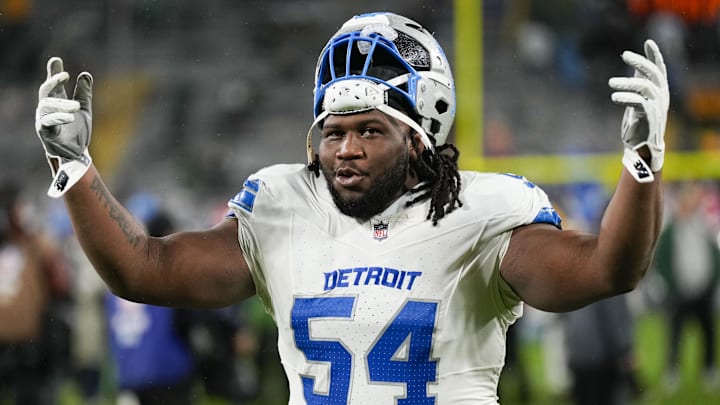 Detroit Lions defensive lineman Alim McNeill (54) celebrates as he runs off the field following the game against the Packers