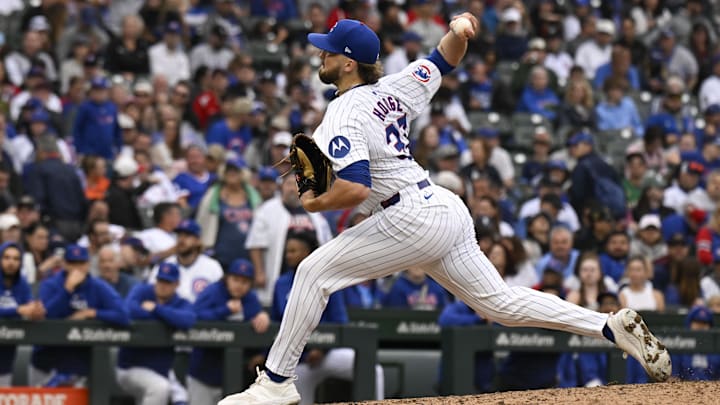 Sep 28, 2024; Chicago, Illinois, USA; Chicago Cubs pitcher Porter Hodge (37) delivers against the Cincinnati Reds during the ninth inning at Wrigley Field. Sep 28, 2024; Chicago, Illinois, USA; Chicago Cubs pitcher Porter Hodge (37) delivers against the Cincinnati Reds during the ninth inning at Wrigley Field.