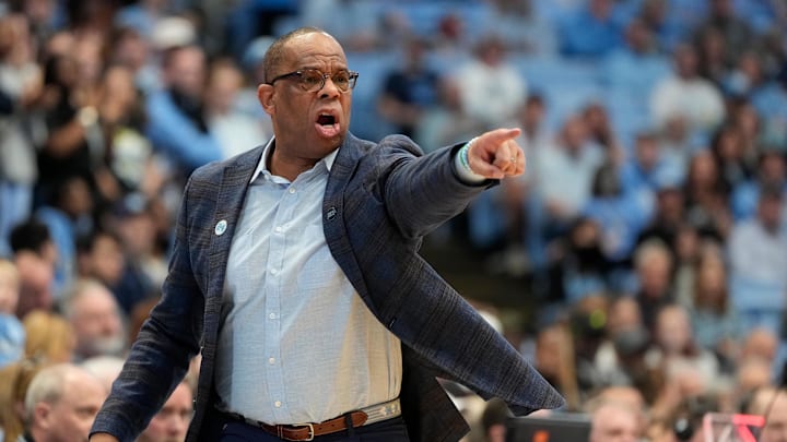 Mar 1, 2025; Chapel Hill, North Carolina, USA;  North Carolina Tar Heels head coach Hubert Davis reacts in the first half at Dean E. Smith Center. Mandatory Credit: Bob Donnan-Imagn Images