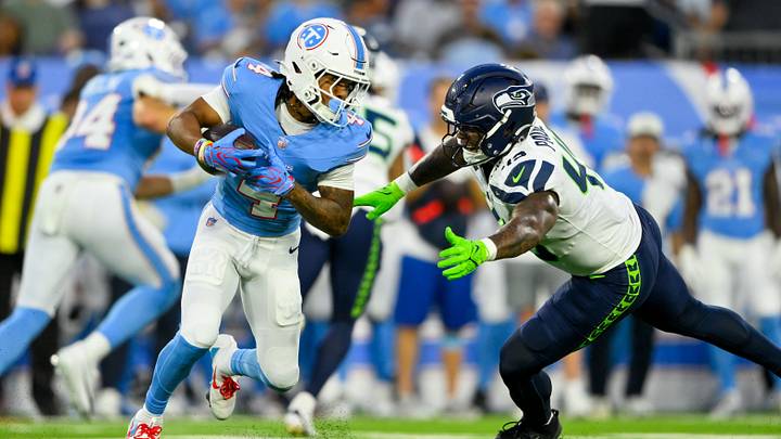 Seattle Seahawks linebacker Chris Paul Jr. (49) tackles Tennessee Titans wide receiver Wan'Dale Robinson (4) after a made catch during the first half at Nissan Stadium. Seattle Seahawks linebacker Chris Paul Jr. (49) tackles Tennessee Titans wide receiver Wan'Dale Robinson (4) after a made catch during the first half at Nissan Stadium.