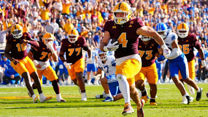 Arizona State running back Cam Skattebo (4) rushed for 3 touchdowns in the Sun Devils win over BYU. Arizona State running back Cam Skattebo (4) rushed for 3 touchdowns in the Sun Devils win over BYU.