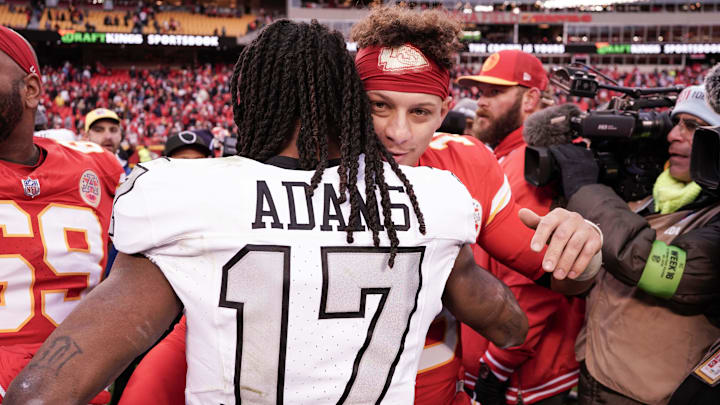Dec 25, 2023; Kansas City, Missouri, USA; Kansas City Chiefs quarterback Patrick Mahomes (15) embraces Las Vegas Raiders wide receiver Davante Adams (17) after the game at GEHA Field at Arrowhead Stadium. Mandatory Credit: Denny Medley-Imagn Images