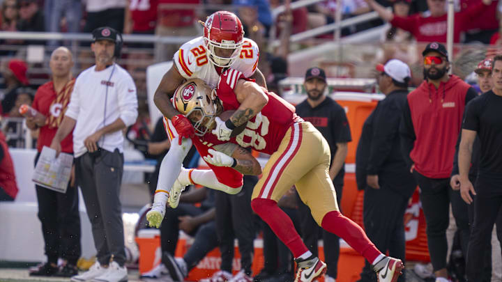 October 20, 2024; Santa Clara, California, USA; San Francisco 49ers tight end George Kittle (85) catches the football against Kansas City Chiefs safety Justin Reid (20) during the second quarter at Levi's Stadium. Mandatory Credit: Kyle Terada-Imagn Images October 20, 2024; Santa Clara, California, USA; San Francisco 49ers tight end George Kittle (85) catches the football against Kansas City Chiefs safety Justin Reid (20) during the second quarter at Levi's Stadium. Mandatory Credit: Kyle Terada-Imagn Images