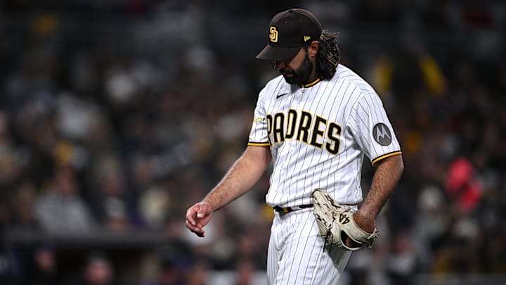 Mar 30, 2023; San Diego, California, USA; San Diego Padres relief pitcher Nabil Crismatt (74) walks to the dugout during the middle of the sixth inning against the Colorado Rockies at Petco Park. Mandatory Credit: Orlando Ramirez-Imagn Images Mar 30, 2023; San Diego, California, USA; San Diego Padres relief pitcher Nabil Crismatt (74) walks to the dugout during the middle of the sixth inning against the Colorado Rockies at Petco Park. Mandatory Credit: Orlando Ramirez-Imagn Images