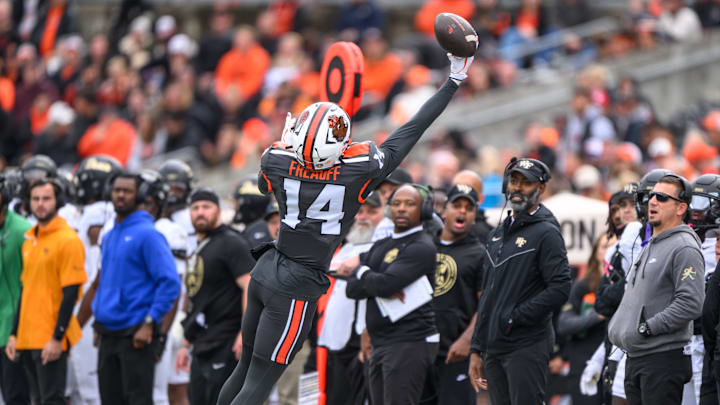 Oct 11, 2025; Corvallis, Oregon, USA; Oregon State Beavers wide receiver Eddie Freauff (14) reaches for the ball during the second quarter against the Wake Forest Demon Deacons at Reser Stadium. Mandatory Credit: Craig Strobeck-Imagn Images
