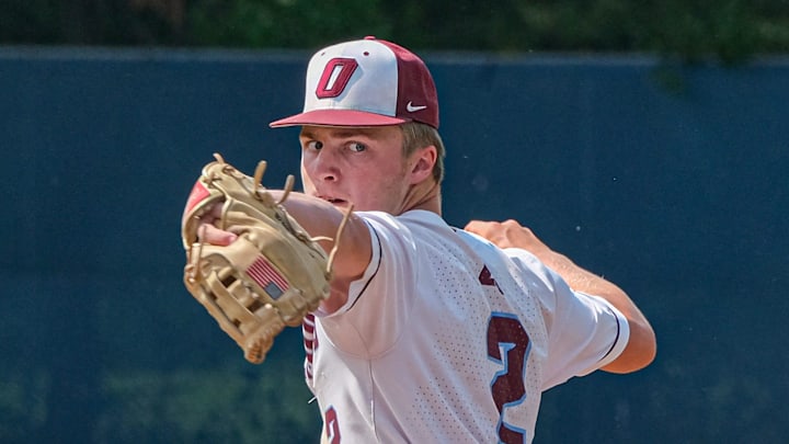 Okemos pitcher Caleb Bonemer (2) pitches in the District Final against Grand Ledge Saturday, June 3, 2023. Bonemer also hit three home runs against the Comets.