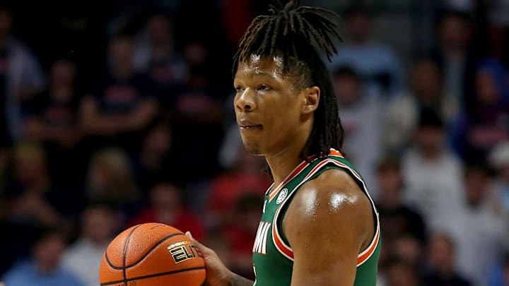 Dec 2, 2025; Oxford, Mississippi, USA; Miami Hurricanes forward Shelton Henderson (7) dribbles during the first half against the Mississippi Rebels at The Sandy and John Black Pavilion at Ole Miss. Mandatory Credit: Petre Thomas-Imagn Images Dec 2, 2025; Oxford, Mississippi, USA; Miami Hurricanes forward Shelton Henderson (7) dribbles during the first half against the Mississippi Rebels at The Sandy and John Black Pavilion at Ole Miss. Mandatory Credit: Petre Thomas-Imagn Images
