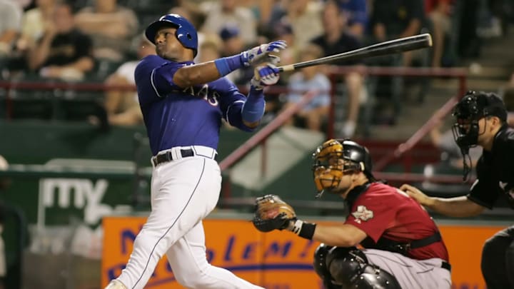 Sammy Sosa teeing off. Sammy Sosa teeing off.