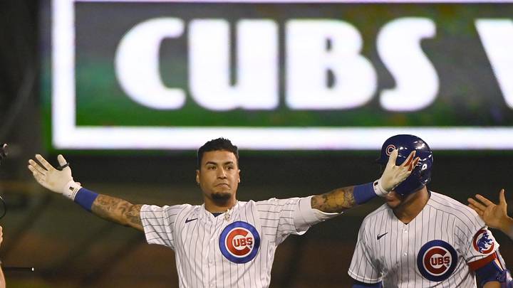 Jul 26, 2021; Chicago, Illinois, USA;  Chicago Cubs shortstop Javier Baez (9), reacts after hitting a walk off single against the Cincinnati Reds during the ninth inning at Wrigley Field. Mandatory Credit: Matt Marton-Imagn Images