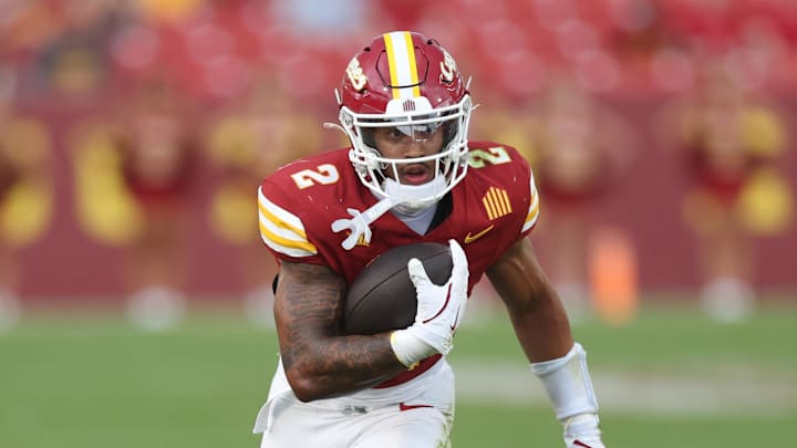 Aug 30, 2025; Ames, Iowa, USA; Iowa State Cyclones running back Dylan Lee (2) runs for a first down against the South Dakota Coyotes in the second half at Jack Trice Stadium. Mandatory Credit: Reese Strickland-Imagn Images